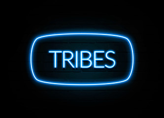 Tribes  - colorful Neon Sign on brickwall