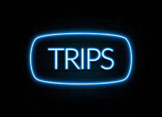 Trips  - colorful Neon Sign on brickwall
