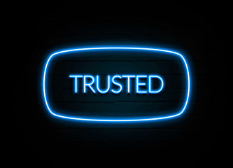 Trusted  - colorful Neon Sign on brickwall