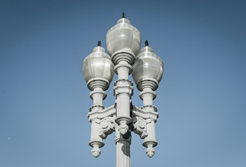 Isolated decorative street lamp. Outdoor antique style streetlamp. Outdoor architecture details.