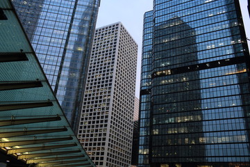 Fototapeta premium offices and glass buildings in the city of life, low angle view in Hong Kong Central financial zone 