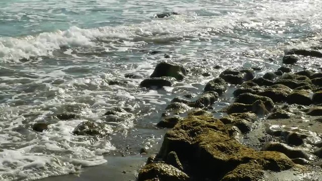 Ocean waves beat on the rocks