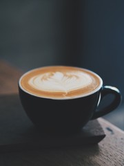 coffee latte art in cafe.