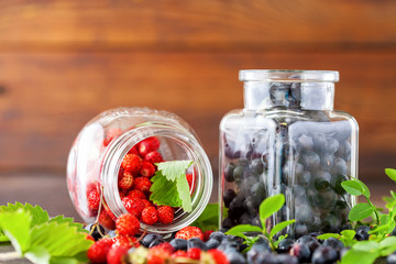 Fresh and healthy forest berries, blueberries and strawberries. Selective focus