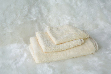 Set of Children's towel on white fur.