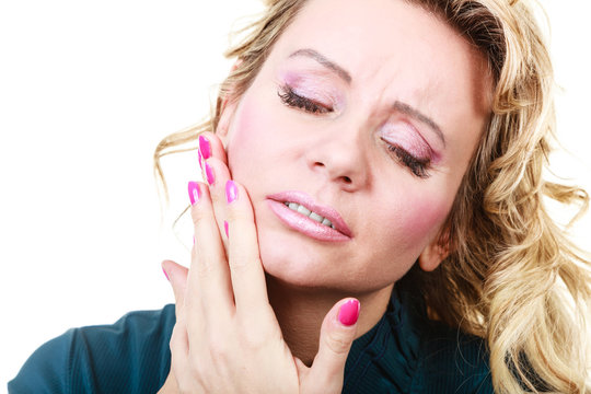 Woman with toothache problem