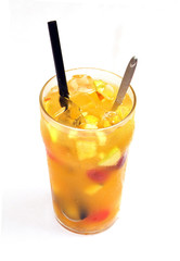 A cup of fruit-tea on white background