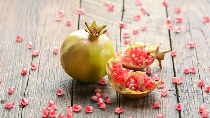 Pomegranate on wooden background