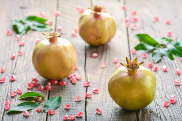 Pomegranate on wooden background