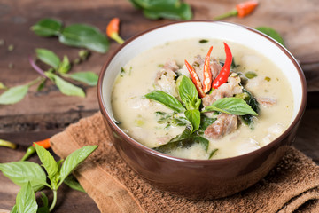 Thai food (Kaeng Khiao Wan),Green curry with pork on wooden background