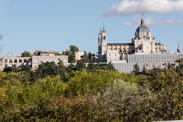 Fototapeta na wymiar Almudena Cathedral and the Royal Palace of Madrid seen from the other side of the Manzanares River