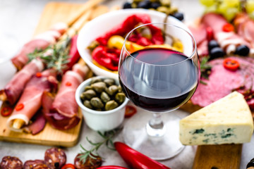 Traditional spanish tapas, wine snack set, food from spain, cheese, meat, vegetables and other...