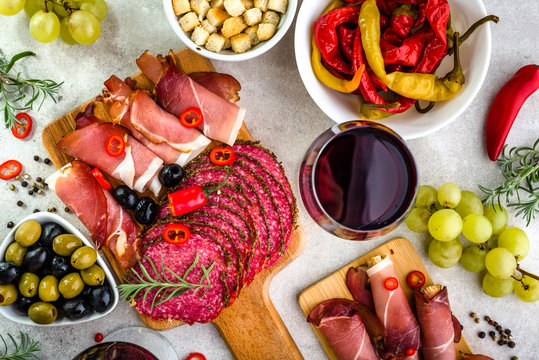 Restaurant With Spanish Table, Food, Wine And Tapas, Meat Slices And Vegetables, Traditional Appetizers From Spain, Flatlay, Overhead