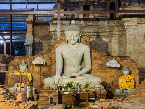   The stucco Buddha statue in the ancient pagoda build by King Anawrahta at Ta Mok Shwe-gu-gyi Temple, Mandalay, Mynanmar