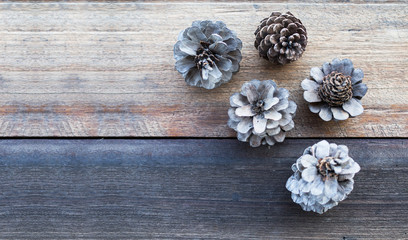 Vintage filtered, Pine flower on wood table, flat lay, nature and relax concept