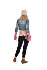 Naklejka premium full length portrait of a cute girl wearing fall fashion, standing pose on white background.