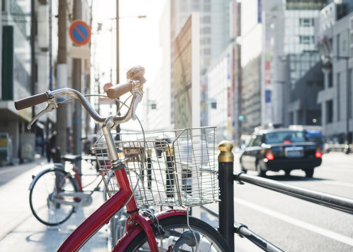 Fototapeta Bicycle parking street with car Transportation Urban lifestyle Japan Osaka city