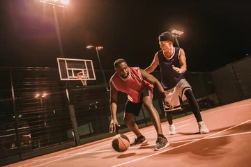 Fotobehang Guys playing basketball © georgerudy