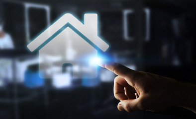 Businessman touching 3D rendering icon house with his finger