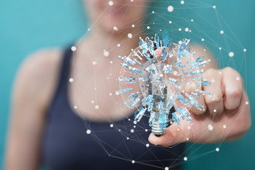 Businesswoman holding a lighbulb with connections in her hand