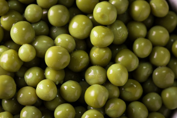 canned Green peas l on old wooden background,healthy vegan food