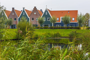 Volendam is a town in North Holland in the Netherlands. Colored houses of marine park in Volendam. North Holland, Netherlands.