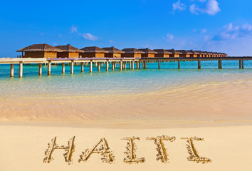Word Haiti on beach