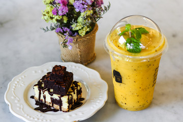 chocolate cheesecake topping brownie and passion smoothie