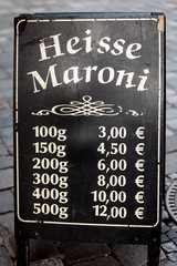 price list sign for hot sweet chestnuts in germany