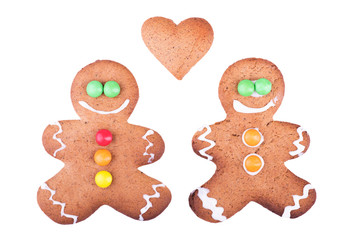 Men and heart of ginger cookies. Isolated on white background