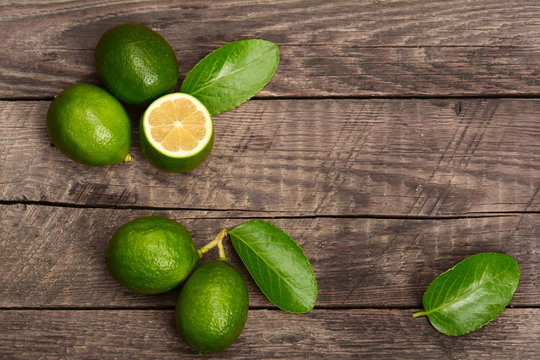 Juicy lime on a wooden background