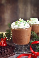 Festive chocolate mousse with whipped cream .Tinted photo.