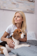 woman with dog at home