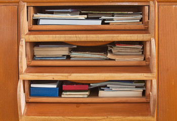 Drawers with books and maps