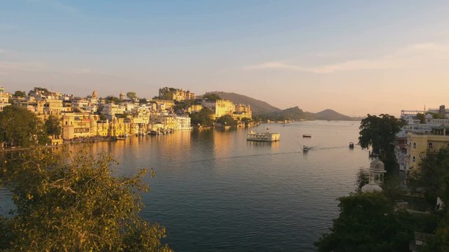 Udaipur Rajasthan India. Time lapse at sunset from above. Travel destination and tourism landmarks.