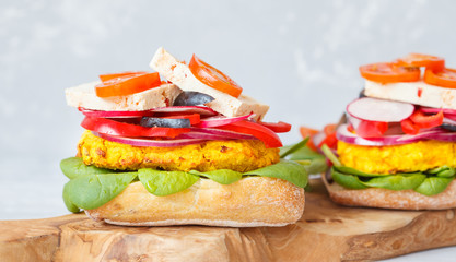 Vegan sandwich with lentils, tofu and vegetables.