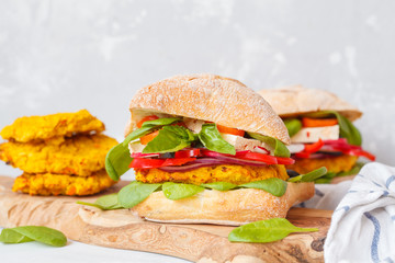 Vegan burgers with lentils, tofu and vegetables.