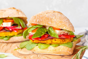 Vegan lentils burgers with tofu and vegetables.