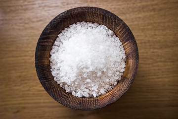 Sea salt in a wooden salt shaker