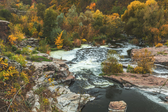 Terrific view of the River Canyon on a cloudy fall day. Buky Canyon on the Hirs'kyi Tikych river in Ukraine. Toned photo.
