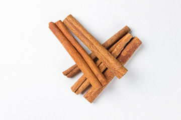 Cinnamon sticks on white background. Canella isolated. Cassia bark.