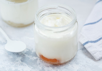 Homemade fruit yogurt in a glass jar