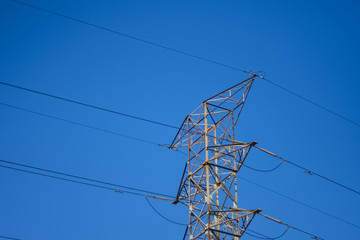 Electrical Powerlines against Blue Sky