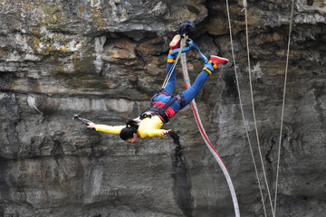 Bungee jumps, extreme and fun sport. Bungee in a cave.