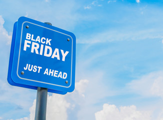 Black Friday sale concept, blue road sign with beautiful sky background.
