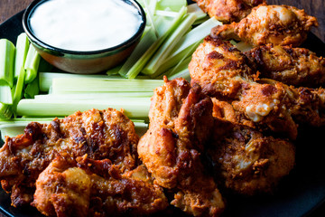 Buffalo Wings with Dip Sauce and Leek