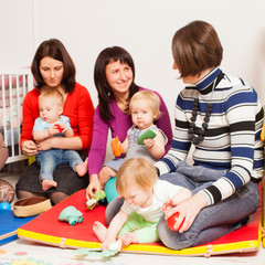 Group of mothers with their babies
