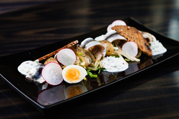 Sprat salad with eggs