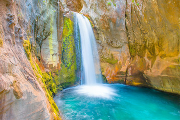 Fototapeta na wymiar Small waterfall and natural pool in Sapadere canyon near Alanya in Turkey