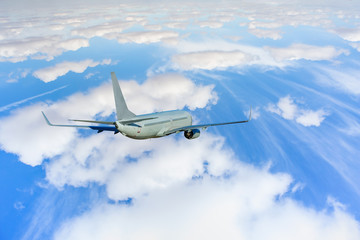 passenger airplane in the clouds. travel by air transport